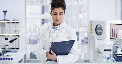 Buy stock photo Scientist, clipboard and woman with medical research, writing or healthcare notes in laboratory. Document, doctor and report with chemist, test results or development for study or experiment planning