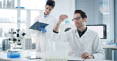 Buy stock photo Man, scientist and team with beaker at lab with clipboard, documents or medical research for virus cure. People, science and woman with review, checklist and pharma study for vaccine development