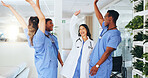 Hands stack, team and happy with doctors in hospital for good news, healthcare promotion and support. Medical achievement, collaboration and bonus with group of people in clinic for celebration