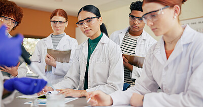 Buy stock photo Science teacher, students or lesson with demonstration for education or practical learning in class. Group, learners and watching instructor with sample for experiment or asessment in school lab