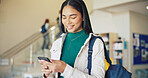 Education, phone and typing with girl student on high school campus for communication or study. App, learning and text message with happy teen learner in corridor for agenda, schedule or timetable