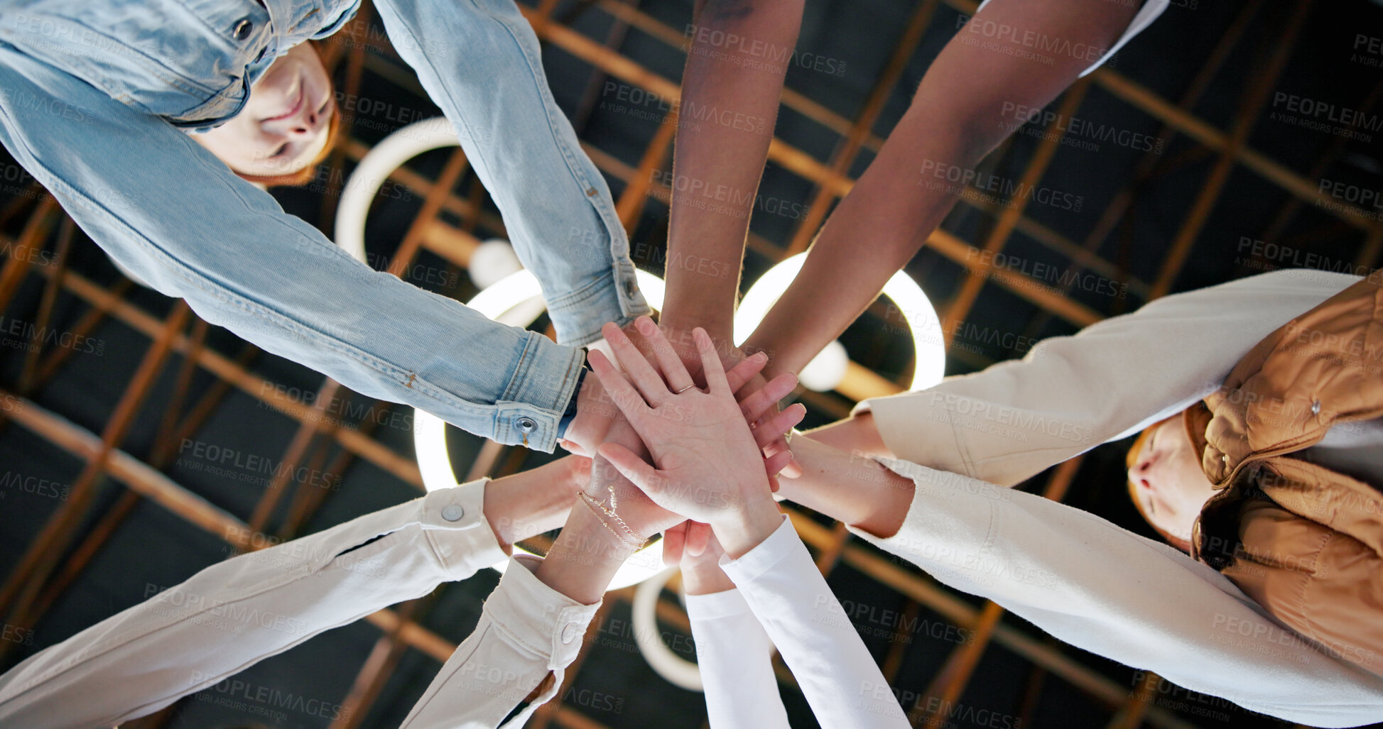 Buy stock photo People, meeting and unity with hands together below for collaboration, inclusion or mission. Low angle, group or creative community with pile or stack in solidarity, huddle or circle for teamwork