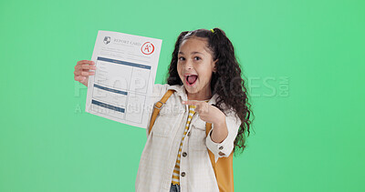 Buy stock photo Happy student, green screen and girl with report card, pointing and excited on studio background. Portrait, mockup space and kid with education, knowledge and celebration for test results and success