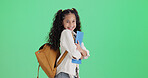 Book, child and student on green screen in studio with mockup space, learning and smile for growth. Happy kid, cute girl and learner with backpack, future development and portrait on background