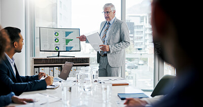Buy stock photo Businessman, screen and presentation with graphs in meeting for finance paperwork, kpi or planning. Group, monitor or presenter with team, document or point at trend analysis for investment in office