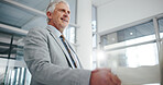 Business, mature man and handshake in office for welcome, introduction and partnership. Low angle, people and shaking hands for greeting, employee agreement and thank you for onboarding opportunity