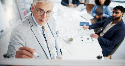 Buy stock photo Man, writing and presentation with board, boardroom or brainstorming for financial growth in meeting. Mature investment banker, talking and risk analysis for project with people, discussion and above