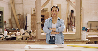 Buy stock photo Portrait, carpenter or woman in workshop with arms crossed, woodwork and furniture restoration project. Confident, person and woodworker in factory for carpentry repair, manufacturing and production.