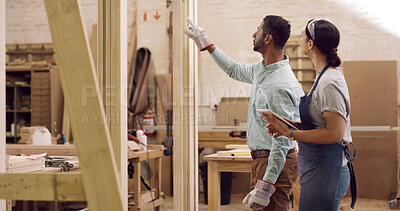 Buy stock photo Carpenter, woodwork and people in factory, inspection for inventory and check timber. Small business, man and woman in workplace, cooperation and conversation for production material or manufacturing