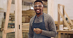 Portrait, carpenter or man with goggles in workshop, furniture production or confident for craftsmanship. Smile, woodworking or African artisan with pride for about us, eyewear or restoration service