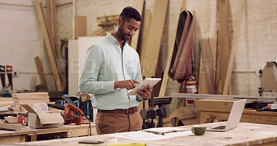Buy stock photo Carpenter, tablet and man in workshop, internet or planning for production process. Small business, furniture industry or person in factory, tech or email for design ideas, inventory or manufacturing