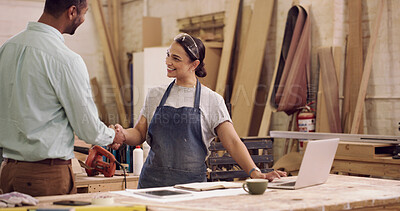 Buy stock photo Carpenter, laptop and people in workshop, handshake for cooperation and production process. Shaking hands, furniture industry and employees in factory, partnership for project, agreement or thank you