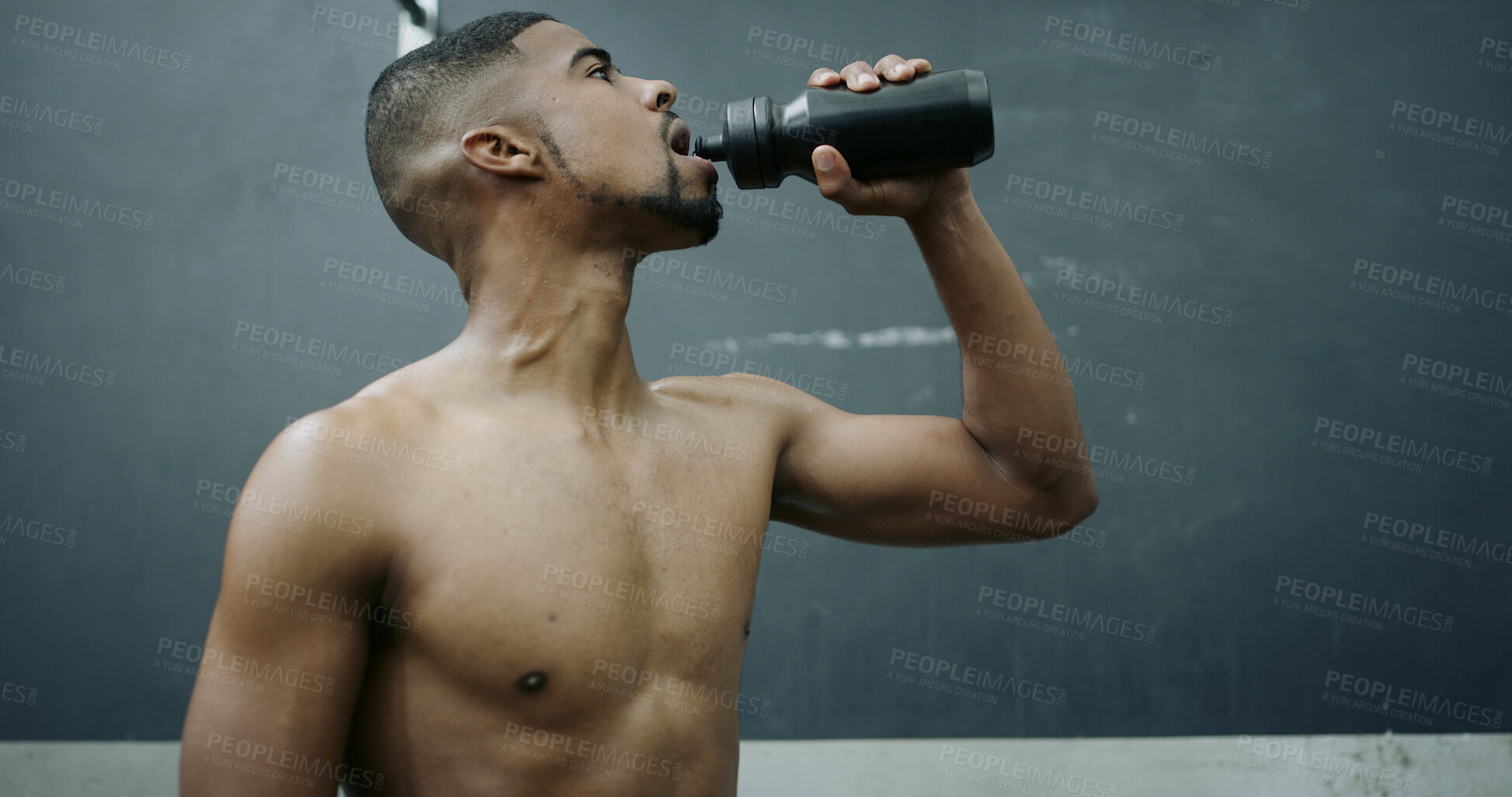 Buy stock photo Fitness, black man and drinking water in gym for health, wellness and training recovery. Shirtless, athlete and hydration with person, bottle and liquid with workout break or nutrition in sports club
