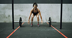 Athlete, fitness and woman with barbell, gym and workout routine for muscle development or wellness. Person, training and bodybuilder with endurance for exercise and weightlifting in health club