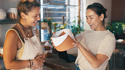 Buy stock photo Customer service, shopping or happy woman with pottery for help, quality check or funny joke. People, ceramics store or owner with client for sale, laugh or retail advice with choice for vase product