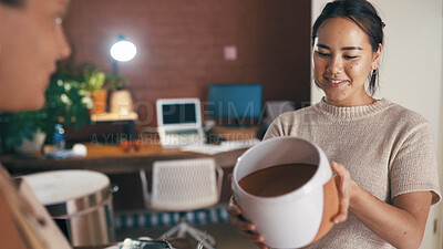 Buy stock photo Customer, shopping and woman with pottery for choice, decision or service in small business. People, ceramics store or owner with client for sale, smile or retail advice with quality check in startup