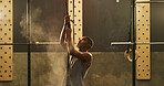 Athlete, black man and climbing with rope at gym for fitness, intense exercise and weightlifting. Male person, powder and strong grip with gear for pull up, strength training and endurance challenge
