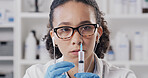 Scientist, syringe and woman with drug, earphones and chemical study in laboratory for education. Biotechnology, medical research and needle for solvent project, podcast and experiment or synthesis