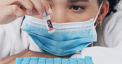 Buy stock photo Woman, vial and blood sample at lab for science with innovation, face mask and medical research. Person, scientist and container with ppe, thinking and pharmaceutical study for vaccine development