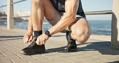 Buy stock photo Person, hands and tying with sneakers for fitness, workout preparation or outdoor exercise. Active, runner or getting ready with shoes or laces for physical activity, health and wellness on promenade