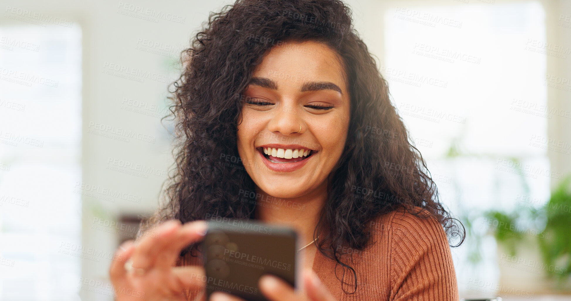 Buy stock photo Smile, social media and woman with phone in home, watch online video and typing message for chat response. Scroll, texting and happy person with mobile for internet browsing, reading blog and news
