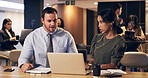 Businessman, woman and laptop with discussion for review, notes and insight at corporate law firm. People, attorney and consultant with computer, team and collaboration with report  at legal agency
