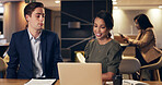 Business people, discussion and team with laptop at night for accounting, sales revenue or planning. Office, overtime and collaboration with auditor on computer for bookkeeping, finance tax and smile