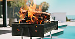 Bbq, flame and wood with grill outdoor of home for celebration, weekend break and fourth of july. Independence  day, barbecue and roast with fire on patio of house for summer vacation and cooking