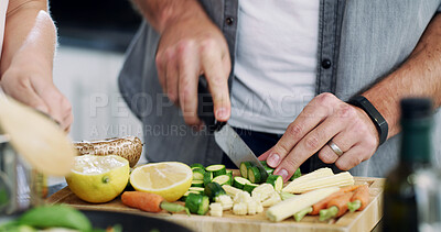 Buy stock photo Fruit, cutting and hands of couple in kitchen for nutrition, bonding and healthy cooking. Food, vegetable and marriage with man and woman helping at home for meal prep, love and wellness together