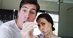 Home, brushing teeth and couple in bathroom, portrait and dental wellness for fresh breath. Apartment, man and toothbrush for oral health, woman and routine for hygiene, morning and mouth care 