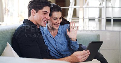 Buy stock photo Waving, video call and happy couple on couch, tablet for communication and greeting in lounge. Home, man and woman on sofa, discussion and tech for online chatting, hello and app for live streaming