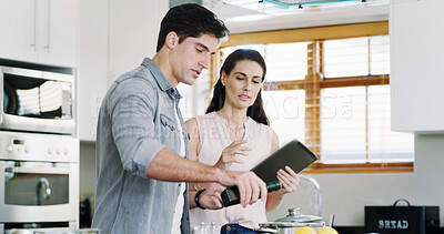 Buy stock photo Home, cooking and couple in kitchen, tablet for online instructions and digital app for recipe checklist. Nutrition, man and tech for meal prep, woman and website info for vegan diet and discussion