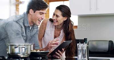 Buy stock photo Funny, cooking and happy couple in kitchen, tablet for online recipe or app for food website. Nutrition, man or tech for social media, woman or instructions for health meal, humor or laughing in home