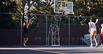 People, fitness and shooting on basketball court with practice, hit rim and training for competition. Team, play sport and game outdoor with hoop, target fail and exercise together for tournament.