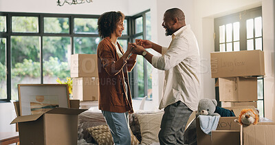 Buy stock photo Moving, dancing and mature couple in new home with boxes for bonding, love and fun together. Happy, marriage and man with woman for groove with celebration of property investment in apartment.