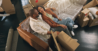 Buy stock photo Moving, relax or couple on sofa in new house, property or investment commitment for real estate purchase. Above, homeowner or mature African people with bonding in residence, smile or unpacking break