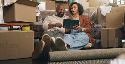 Buy stock photo Boxes, relax and tablet with couple in new home together for planning or property investment. App, conversation and real estate with African people on apartment floor for moving house or relocation