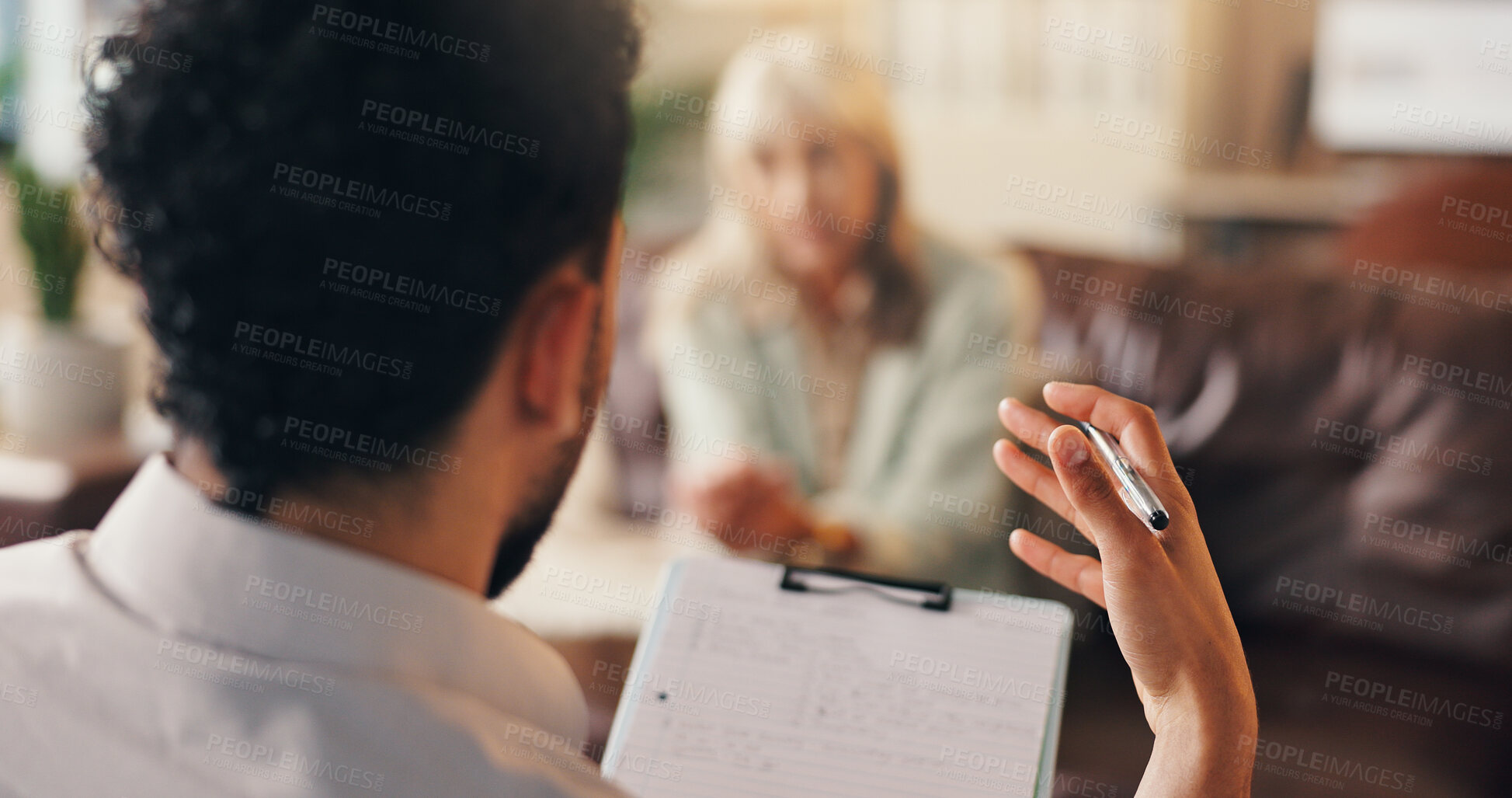 Buy stock photo Man, therapist or counseling with clipboard for advisory, therapy session or psychology. Male person, psychologist and talking with client or notes for understanding, emotional support or trauma help