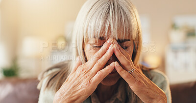 Buy stock photo Anxiety, headache or psychology with senior woman on sofa in living room of home for mental health. Burnout, grief or pain and elderly person with depression in apartment for reaction to trauma