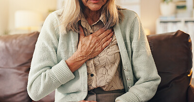 Buy stock photo Old woman, chest pain and hand in home with heart attack symptoms, discomfort and cardiac problem. Senior person, medical issue and health crisis on sofa with angina, asthma and breathing difficulty.