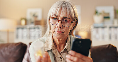 Buy stock photo Pills, reading or old woman with phone in home, medicine dose or research side effects for wellness. Set reminder alarm, mobile or senior person with prescription for recovery, label or instructions