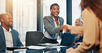 Business, women and meeting with handshake in office for greeting, welcome and investment deal. Team, people and shaking hands for partnership promotion, agreement and negotiation for financial offer