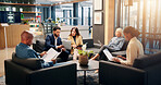 Finance, report and talking with business people in lobby for investment or portfolio management. Collaboration, conversation and meeting with employee group in lounge of financial workplace