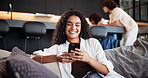 Cellphone, relax and woman on sofa in home with networking, communication or social media online. Happy, phone and female person reading blog with celebrity gossip on mobile app in living room.