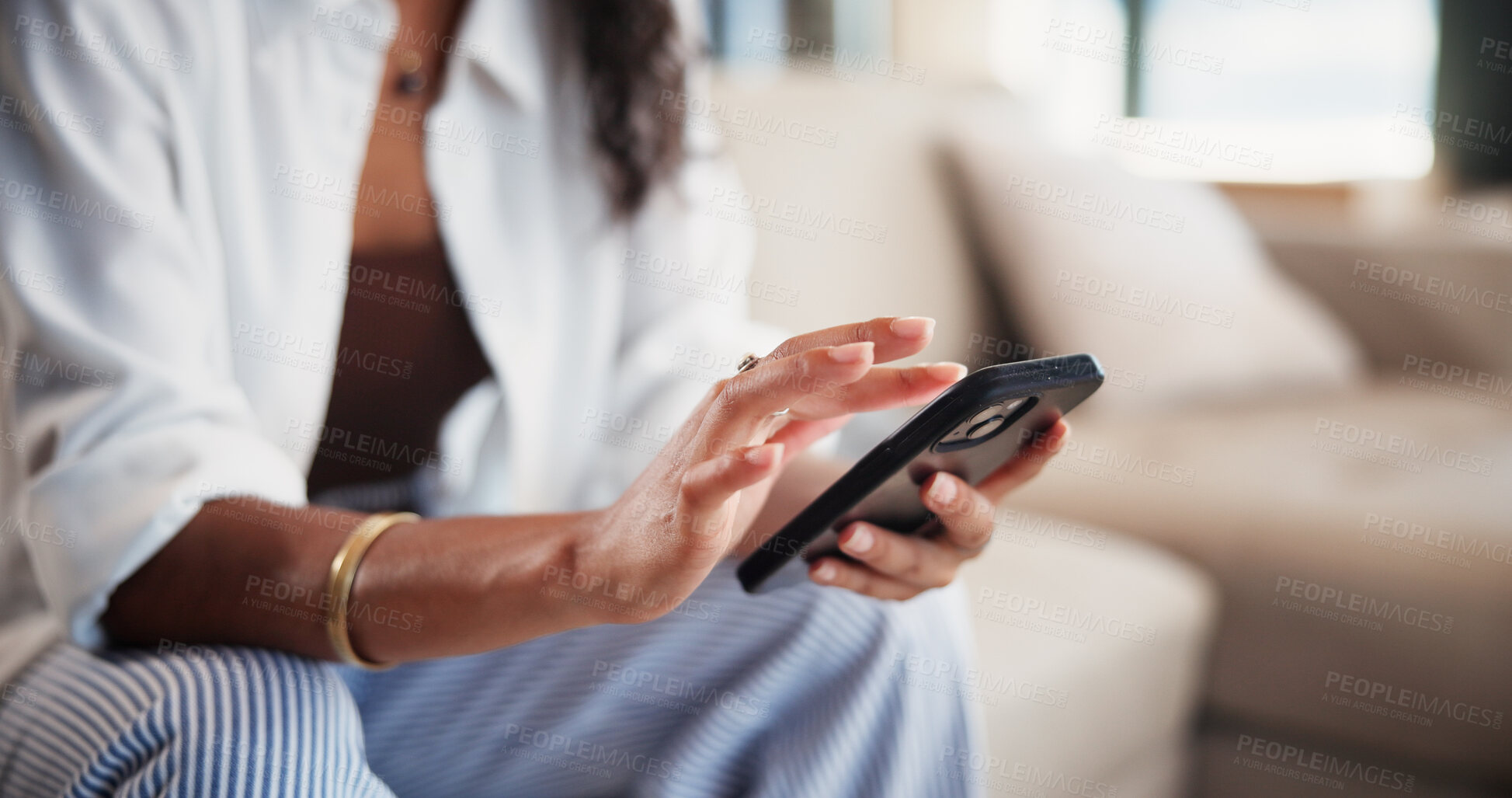 Buy stock photo Hands, woman and typing with phone in home for social media, browsing website and text message. Female person, reading and mobile for networking, celebrity gossip and texting with notification update