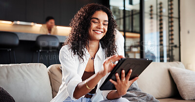 Buy stock photo Woman, tablet and smile on sofa for social media, streaming movie and scroll in living room. Female person, website or subscription on couch in home, search and online in apartment for reading ebook