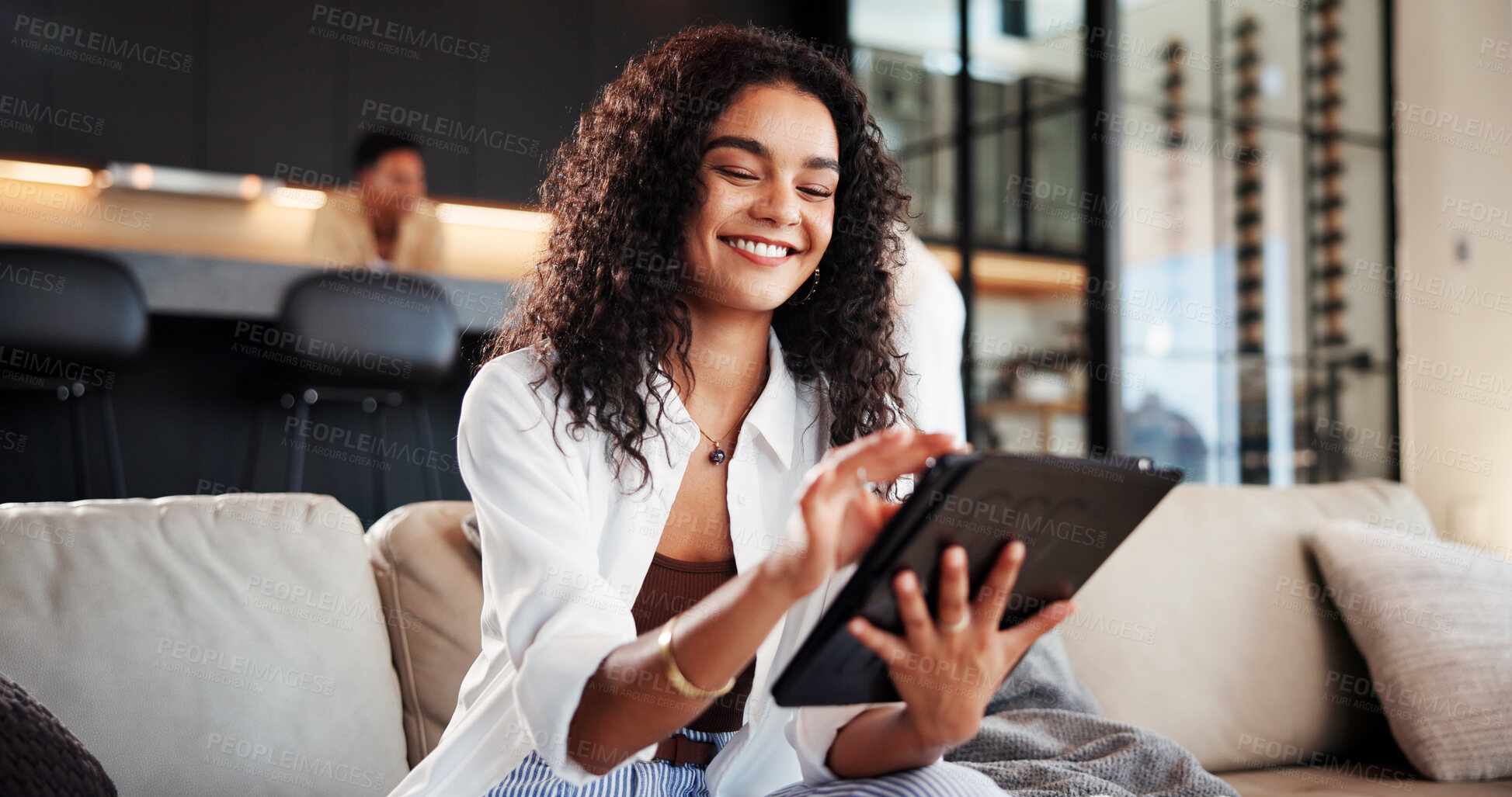 Buy stock photo Woman, tablet and smile on sofa for social media, streaming movie and scroll in living room. Female person, website or subscription on couch in home, search and online in apartment for reading ebook