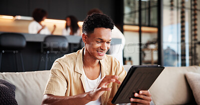 Buy stock photo Smile, man and relax with tablet at house for social media, streaming movie and weekend break. Happy, male person and digital for browsing website, download film and subscription service in lounge