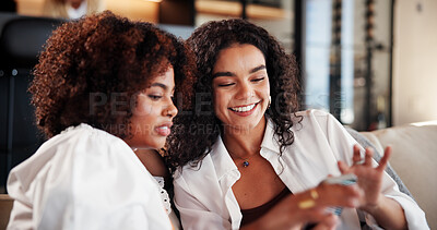 Buy stock photo Women, friends and relax on sofa with phone in home, share meme or funny video in living room. People, smartphone and laugh on couch with joke, post and mobile app for social media at apartment
