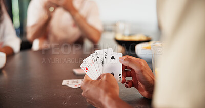 Buy stock photo Hands, friends and playing cards in home with contest, bonding and challenge with snacks on break. People, group and relax with game, strategy and competition with drinks with reunion at apartment